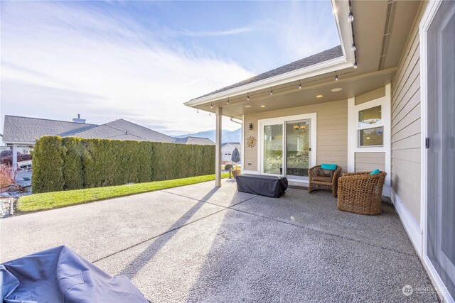 view of patio with a mountain view