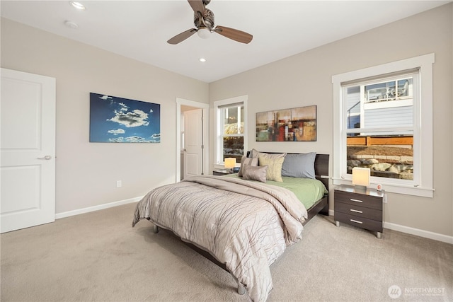 bedroom with recessed lighting, baseboards, a ceiling fan, and light colored carpet