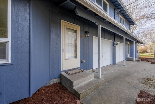 entrance to property featuring a garage