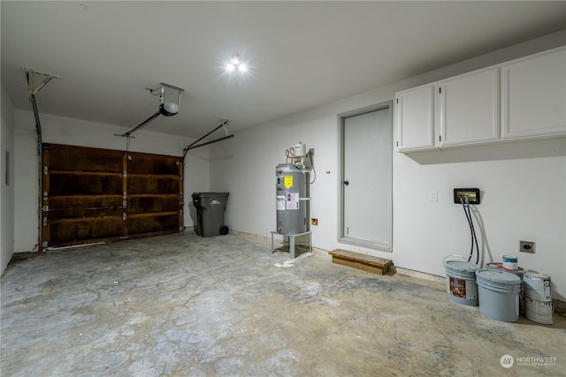 garage featuring a garage door opener and secured water heater