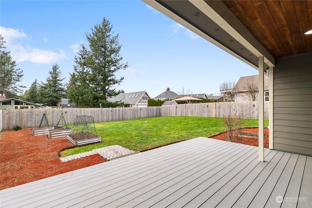 wooden deck with a yard