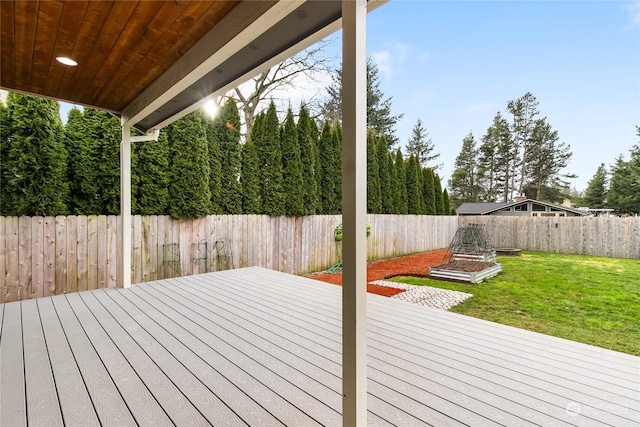 wooden terrace with a yard