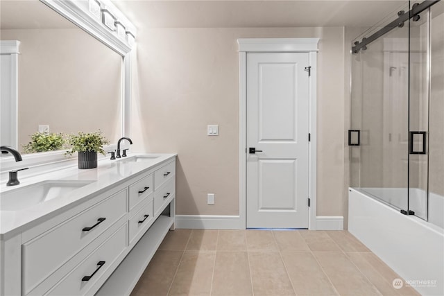 bathroom featuring vanity, tile patterned floors, and shower / bath combination with glass door