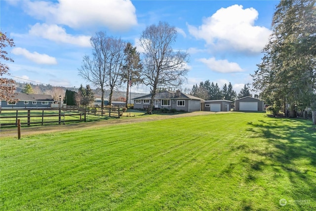 view of yard with a garage