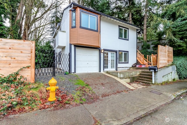 view of front of property featuring a garage