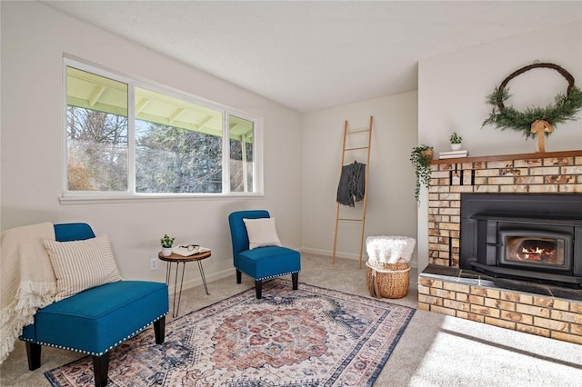 sitting room featuring carpet flooring