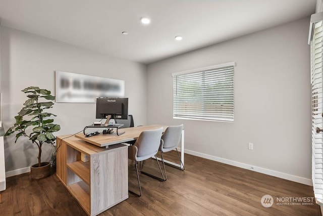 office space featuring dark wood-style floors, recessed lighting, and baseboards