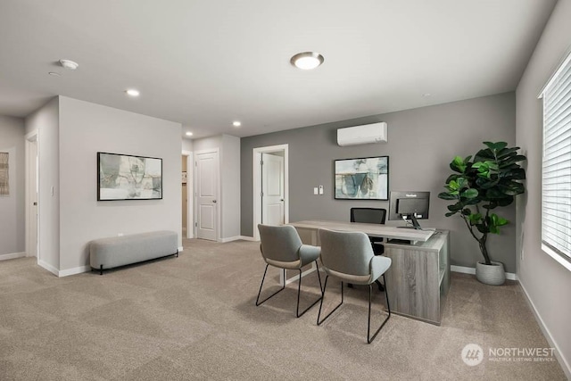 office space with an AC wall unit, recessed lighting, light colored carpet, and baseboards