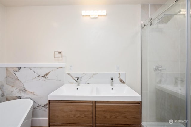 bathroom featuring vanity, separate shower and tub, and tile walls