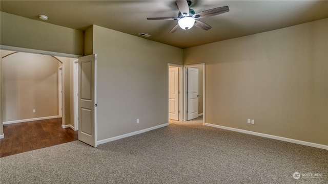 unfurnished bedroom featuring carpet and ceiling fan