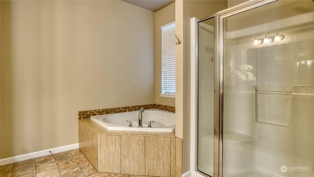 bathroom with independent shower and bath