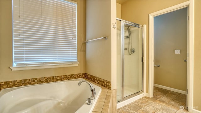 bathroom featuring plus walk in shower