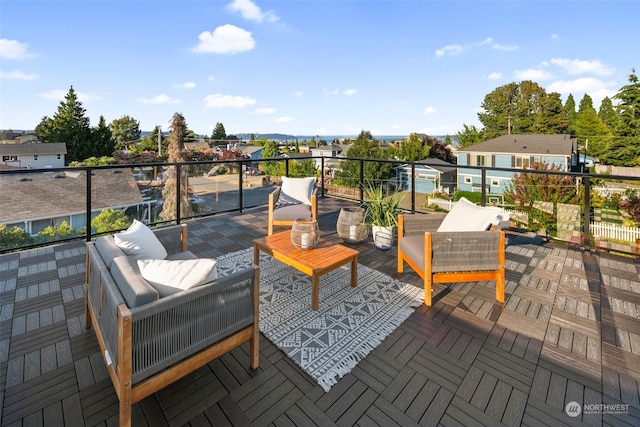 wooden deck featuring outdoor lounge area