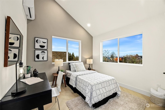 bedroom featuring a wall mounted AC and high vaulted ceiling