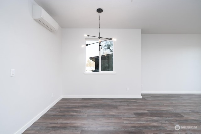 unfurnished dining area with an inviting chandelier, dark hardwood / wood-style flooring, and an AC wall unit