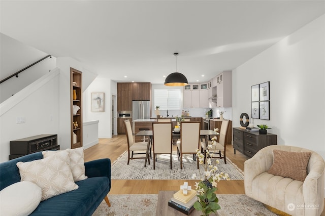 living room with light hardwood / wood-style floors