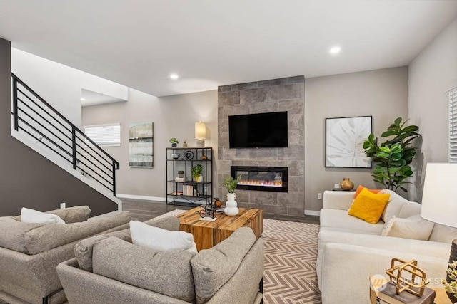 living room with a fireplace and hardwood / wood-style floors