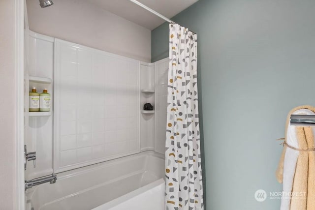 bathroom featuring shower / bath combo with shower curtain