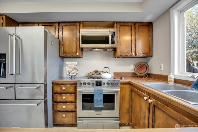 kitchen featuring appliances with stainless steel finishes and sink