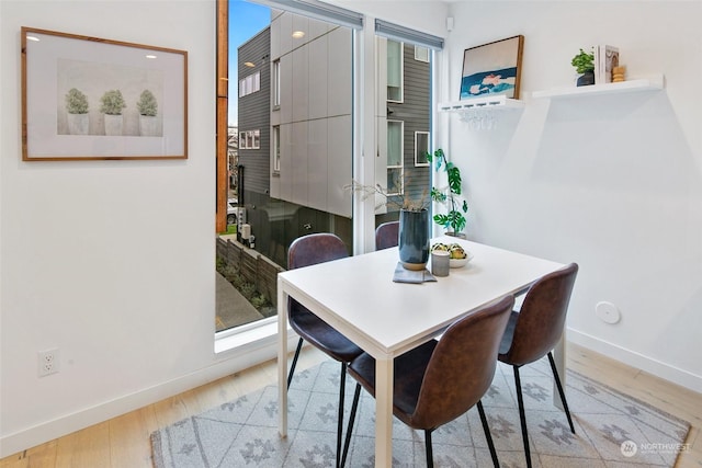 dining room featuring light wood-type flooring