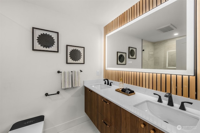 bathroom with tile patterned flooring, vanity, toilet, and a shower with shower door