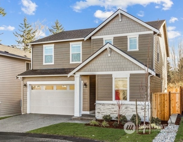 craftsman inspired home featuring a garage