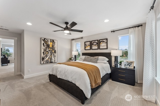 carpeted bedroom with ceiling fan