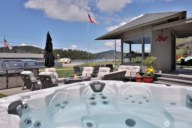 view of patio featuring a water view