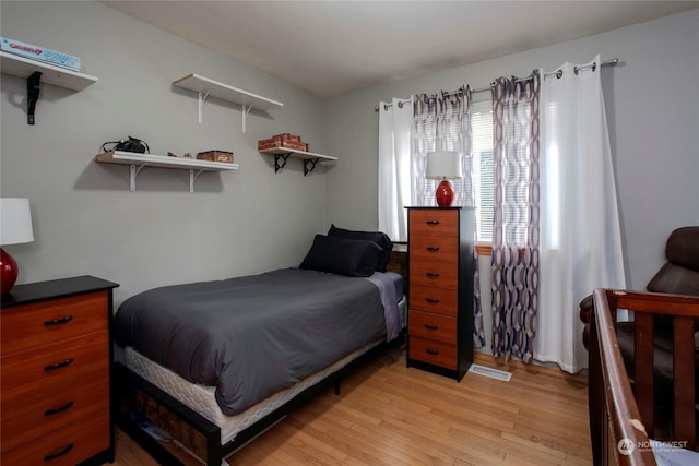 bedroom featuring light hardwood / wood-style floors