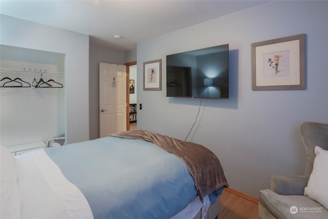 bedroom featuring hardwood / wood-style floors