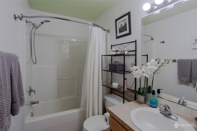 full bathroom featuring shower / bath combination with curtain, vanity, and toilet