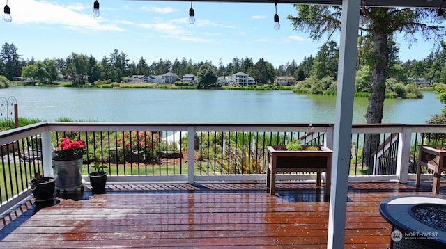 deck featuring a water view