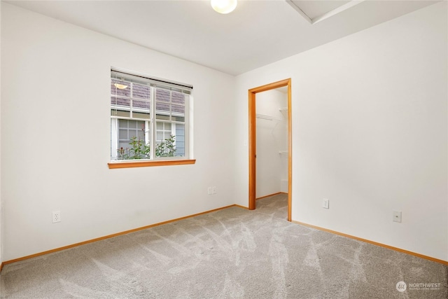 spare room with carpet floors