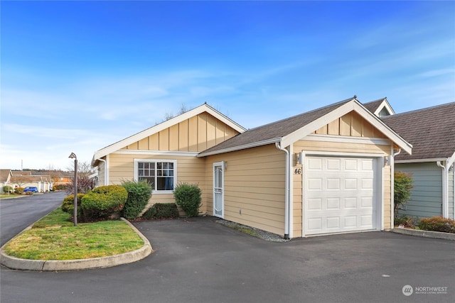 single story home with a garage