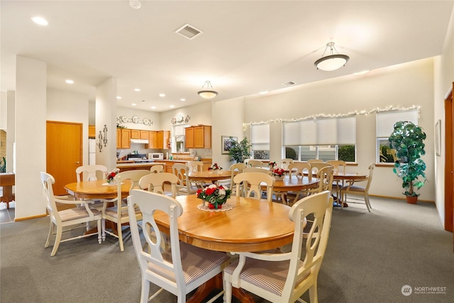 view of carpeted dining room