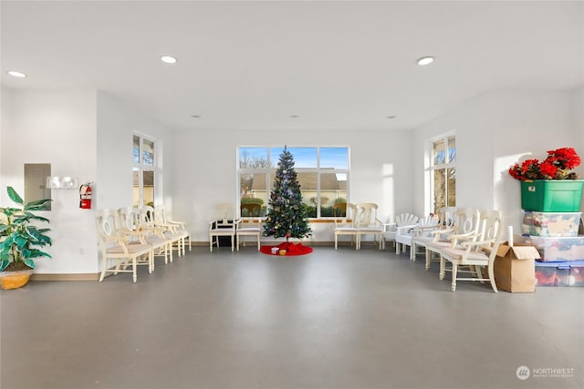 playroom featuring concrete flooring