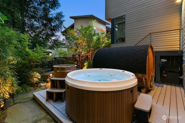 deck with a hot tub