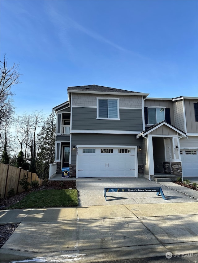 view of front of property with a garage