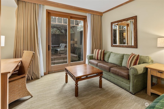 carpeted living room with ornamental molding