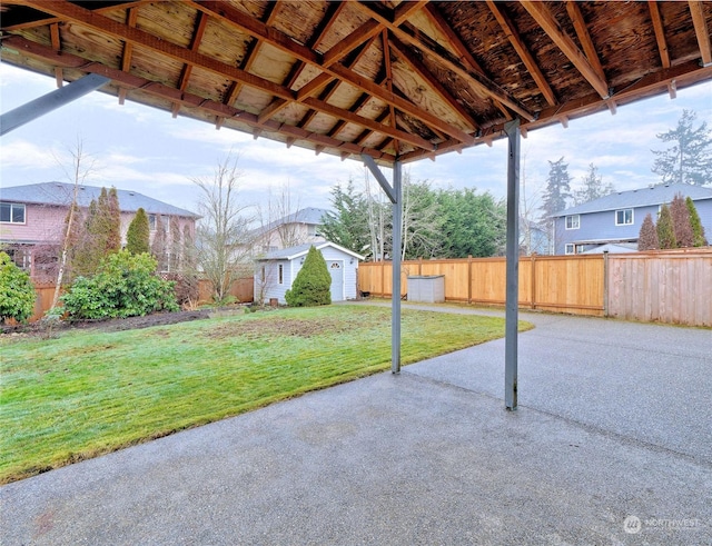 view of patio / terrace featuring a shed