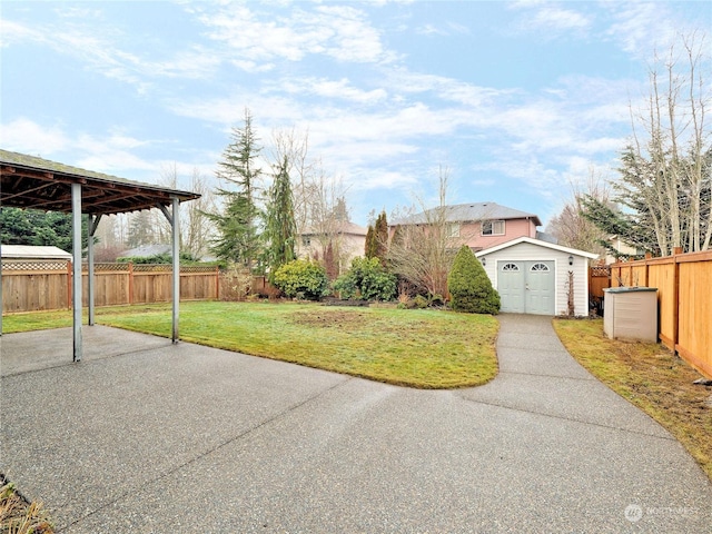 view of yard featuring a storage shed and a patio