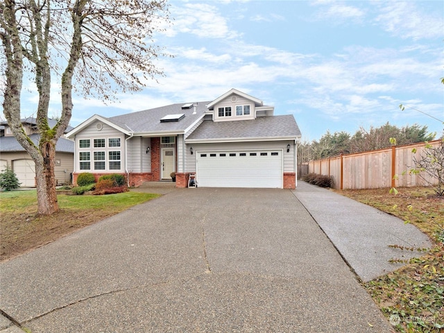 view of front of property featuring a garage