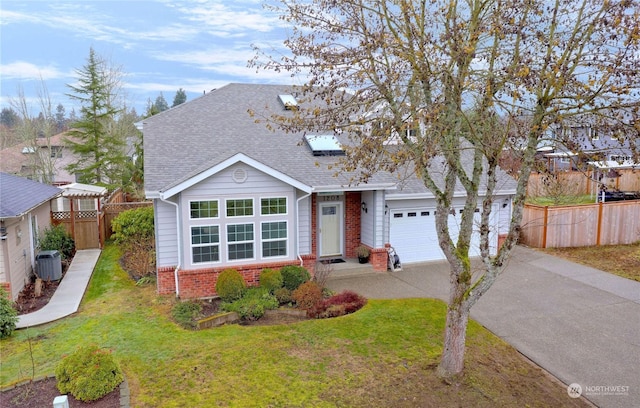 view of front of home featuring a garage, central AC unit, and a front lawn