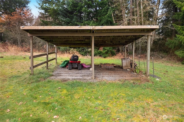 view of yard featuring a carport