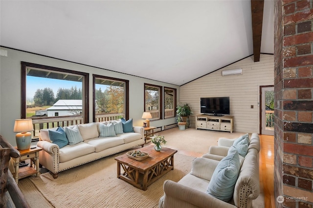 living room featuring lofted ceiling with beams and a wall mounted AC