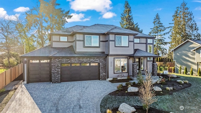 view of front of property featuring a garage