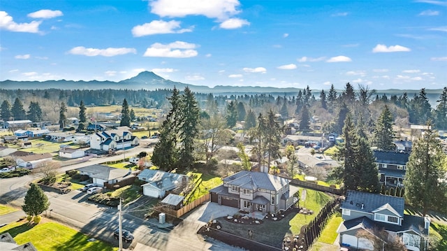 drone / aerial view featuring a mountain view