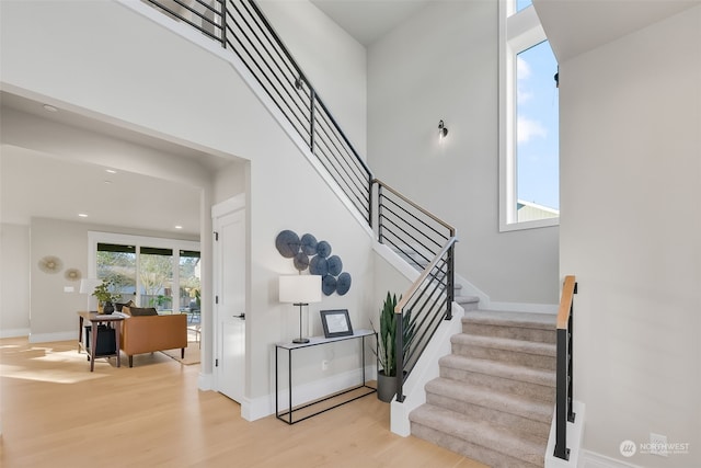 stairway with wood-type flooring