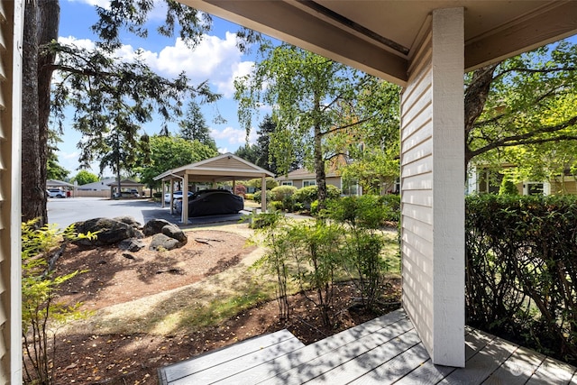 view of yard with a carport