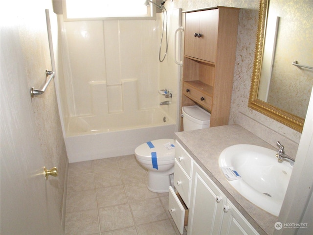 full bathroom with vanity, shower / bathtub combination, and toilet